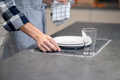 Male hand putting fork on napkin near plate - PhotoDune Item for Sale