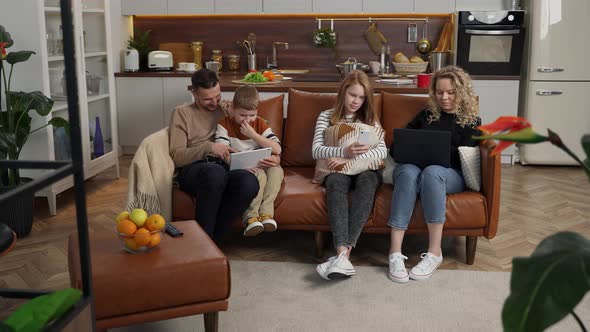 Relaxing Deafmute Family Using Gadgets at Home