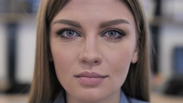 Young Girl Face Looking at Camera