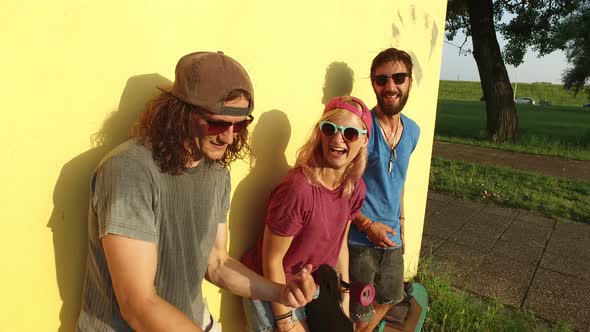 Close up of happy skateboarders having fun