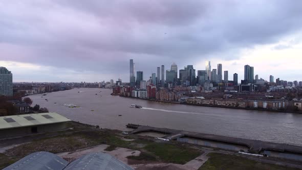 Aerial view of Canary Wharf with Uber Boat by Thames Clippers in London