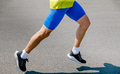 legs male runner running on asphalt road - PhotoDune Item for Sale