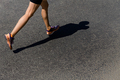 legs girl runner run on asphalt road - PhotoDune Item for Sale