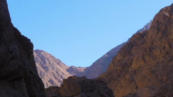 View with rocky mountains at Colored Canyon of Egypt Sinai desert Dahab in sunny day, wide shot with