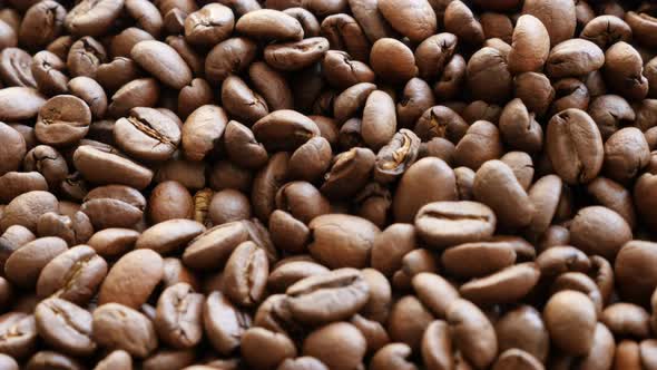 Fresh roasted coffee beans food and drink  background  slow tilt 4K 2160p 30fps UHD video - Slow til