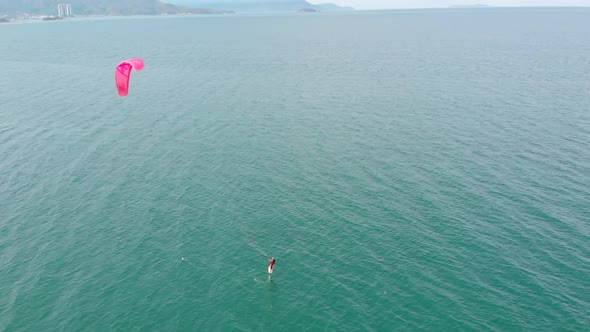 Kite Surfing Place, Sports Concept, Healthy Lifestyle, Human Flight. Aerial View of the City Beach