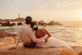 honeymoon couple relax on sunset beach - PhotoDune Item for Sale