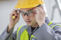 Electrician putting on protective glasses - PhotoDune Item for Sale