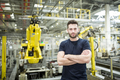 Portrait of confident worker in a modern factory - PhotoDune Item for Sale