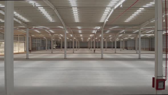 Aerial of an Empty Warehouse, Drone Flying Forward