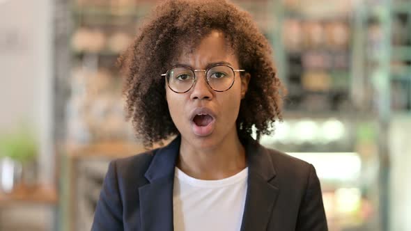 Disappointed African Businesswoman Reacting To Loss 