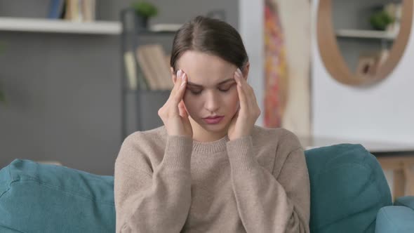 Portrait of Woman Having Headache