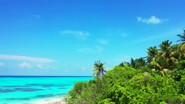 Aerial drone shot scenery of perfect sea view beach voyage by blue sea and white sandy background of