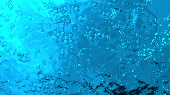 Super Slow Motion Abstract Shot of Swirling Blue Water Background at 1000Fps