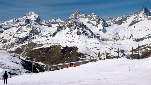 Train Passing By the Matterhorn Mountain in Zermatt