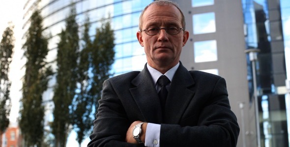 Confident Senior Businessman in Glasses Outside