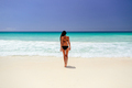 woman on beach vacation in tropics - PhotoDune Item for Sale