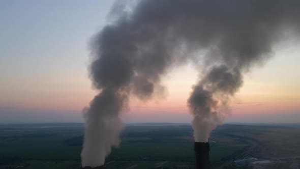 Aerial View of Coal Power Plant High Pipes with Black Smoke Moving Upwards Polluting Atmosphere at