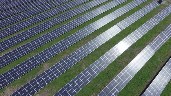 Solar panel produces green, environmentaly friendly energy. Aerial view from drone