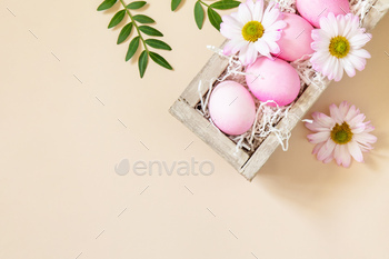  pink eggs on trendy pastel background. Top view flat lay.