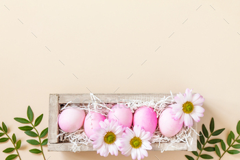  pink eggs on trendy pastel background. Top view flat lay.