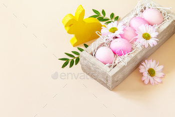  pink eggs on trendy pastel background. Copy space.