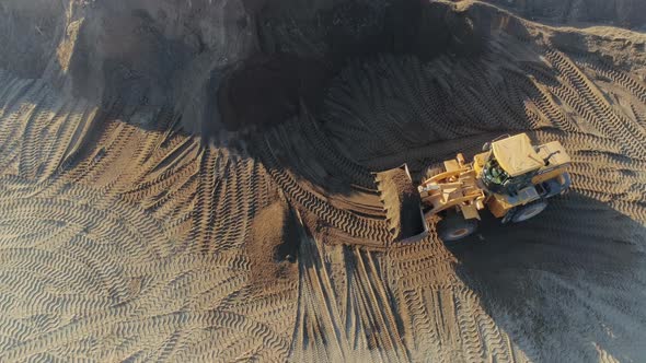 Aerial Top View of the Machines at Work at the Construction Site