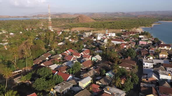 Aerial View Of Gerupuk Fishermen's Village South Lombok, Indonesia - Drone Pullback, Wide Shot