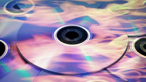 DVD Discs Reflect Fire - Piracy, Burning Media