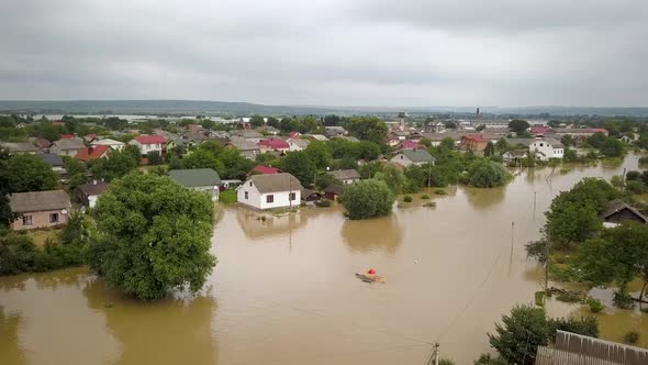 Aerial view of flooded houses with dirty water of Dnister river in Halych town, western Ukraine. alt