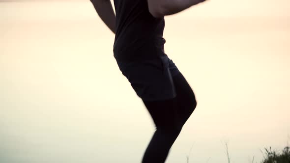 Athlete Man Stretch Legs. Stretching Before Marathon. Workout Before Running Or Trail Jogging.