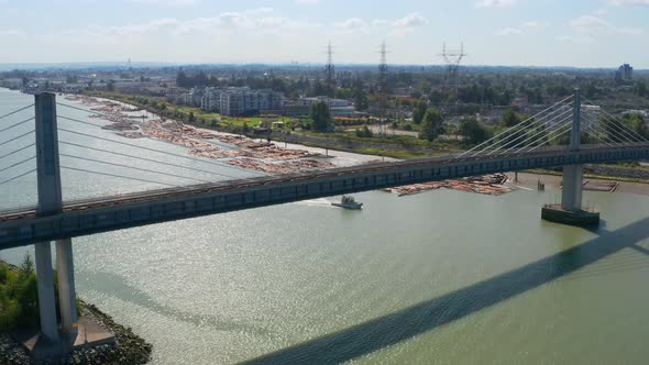 Aerial View Of North Arm Canada Line Skytrain Bridge Over The Fraser River Between Richmond And Vanc