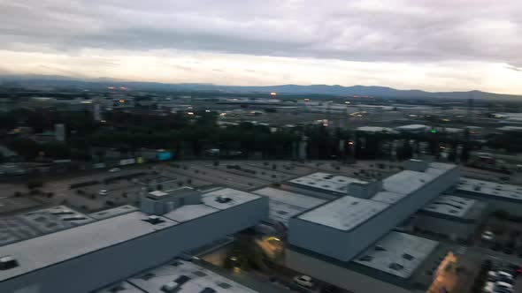 CALENZANO ITALY NOVEMBER 3 2021 Aerial View of Shopping Mall Area and Surrounding Cityscape at