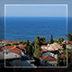 Roofs Of Houses And Dark Blue Sea - VideoHive Item for Sale