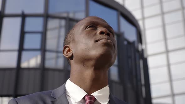 Pensive and Worried Young Black African Businees Man- Slow Motion