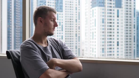 Overworked Tired Office Man Looking in the Window