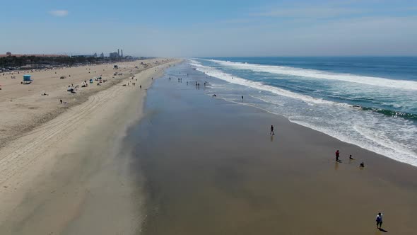 Aerial View of Huntington Beach and Coastline During Hot Blue Sunny Summer Day