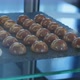 Chocolate and White Chocolate Candies in Shop Window - VideoHive Item for Sale