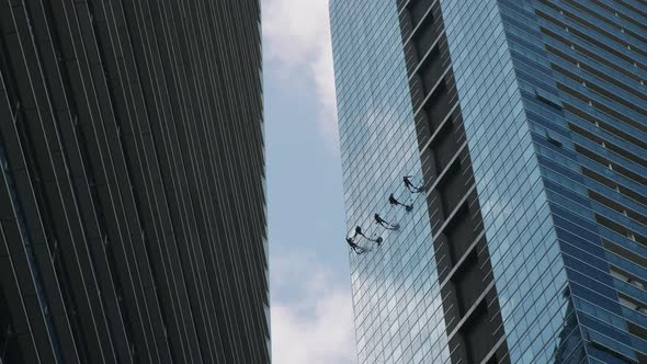 Industrial Climbers Are Washing Windows of Skyscrapers