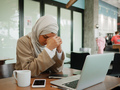 Muslim woman on remote working, online education or video conversation in caffe - PhotoDune Item for Sale
