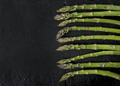 Top view of fresh green asparagus on rustic black board - PhotoDune Item for Sale