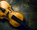 Violin on rustic wooden background from above. - PhotoDune Item for Sale