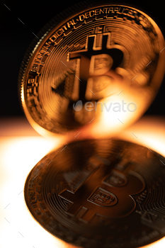 Golden coin with bitcoin symbol