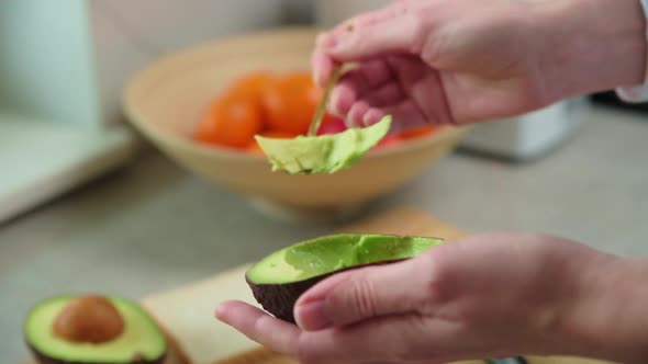 Ripe Avocado in Woman Hands Healthy Breakfast