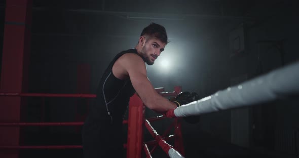 In a Dark Boxing Ring Attractive Strong Fit Body