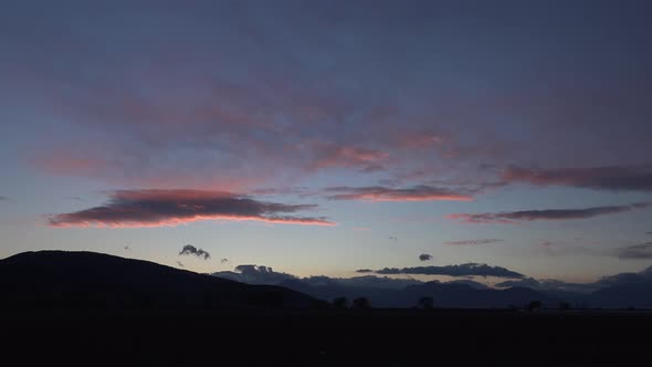 Red Clouds Change to Black at Sunset