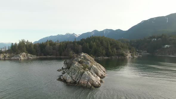 Aerial Panoramic View of Rocky Island on the Pacific Ocean West Coast