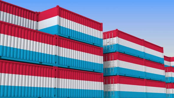 Container Yard Full of Containers with Flag of Luxembourg
