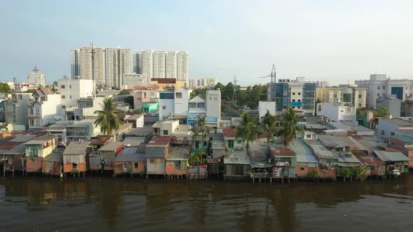 Classic drone shot with contrast of old and new buildings along the canal waterfront in district eig