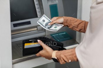 s, transactions, banking and people. Young arabian woman holding dollars and wallet with credit cards near atm machine, cropped, close up, copy space
